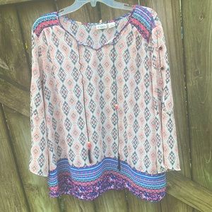 flowy, translucent blouse with button detailing